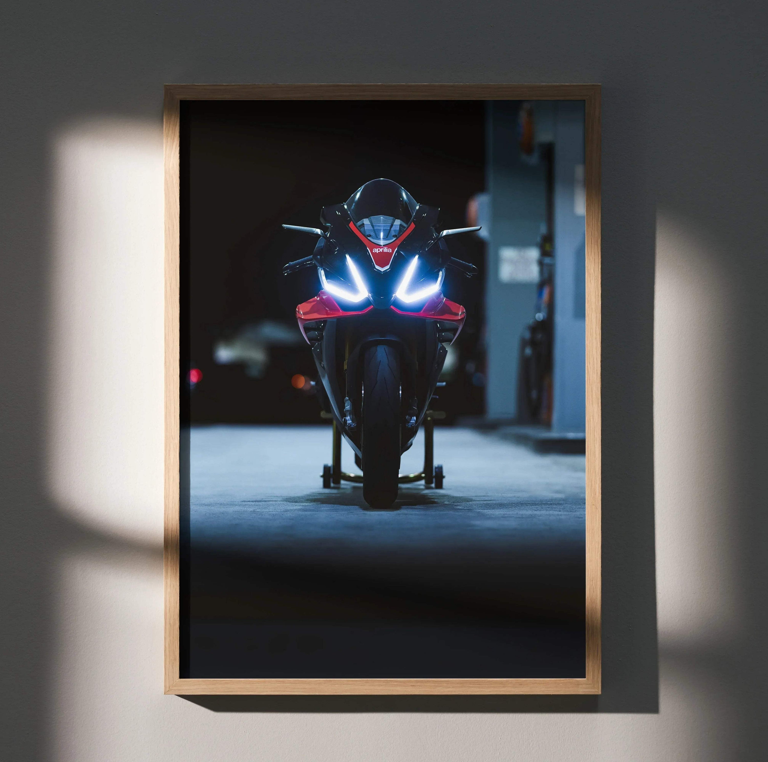 Aprilia RSV4 1100 Factory motorcycle front view poster with glowing headlights wall art.