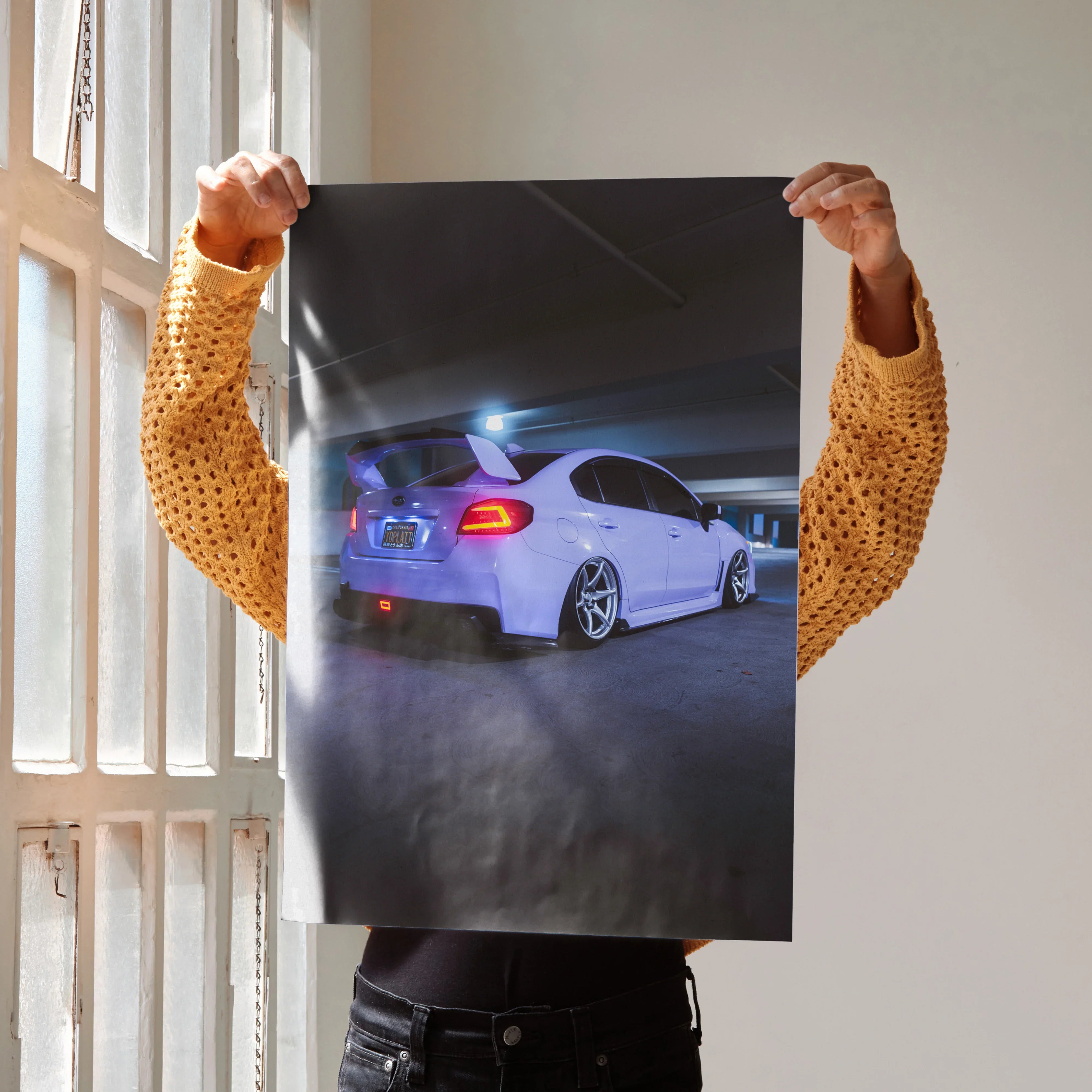 Subaru WRX white car at night poster wall art with glowing taillights and smoke effect.