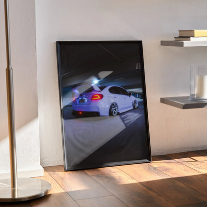 Subaru WRX white sports car poster in black frame leaning on wall, automotive wall art.