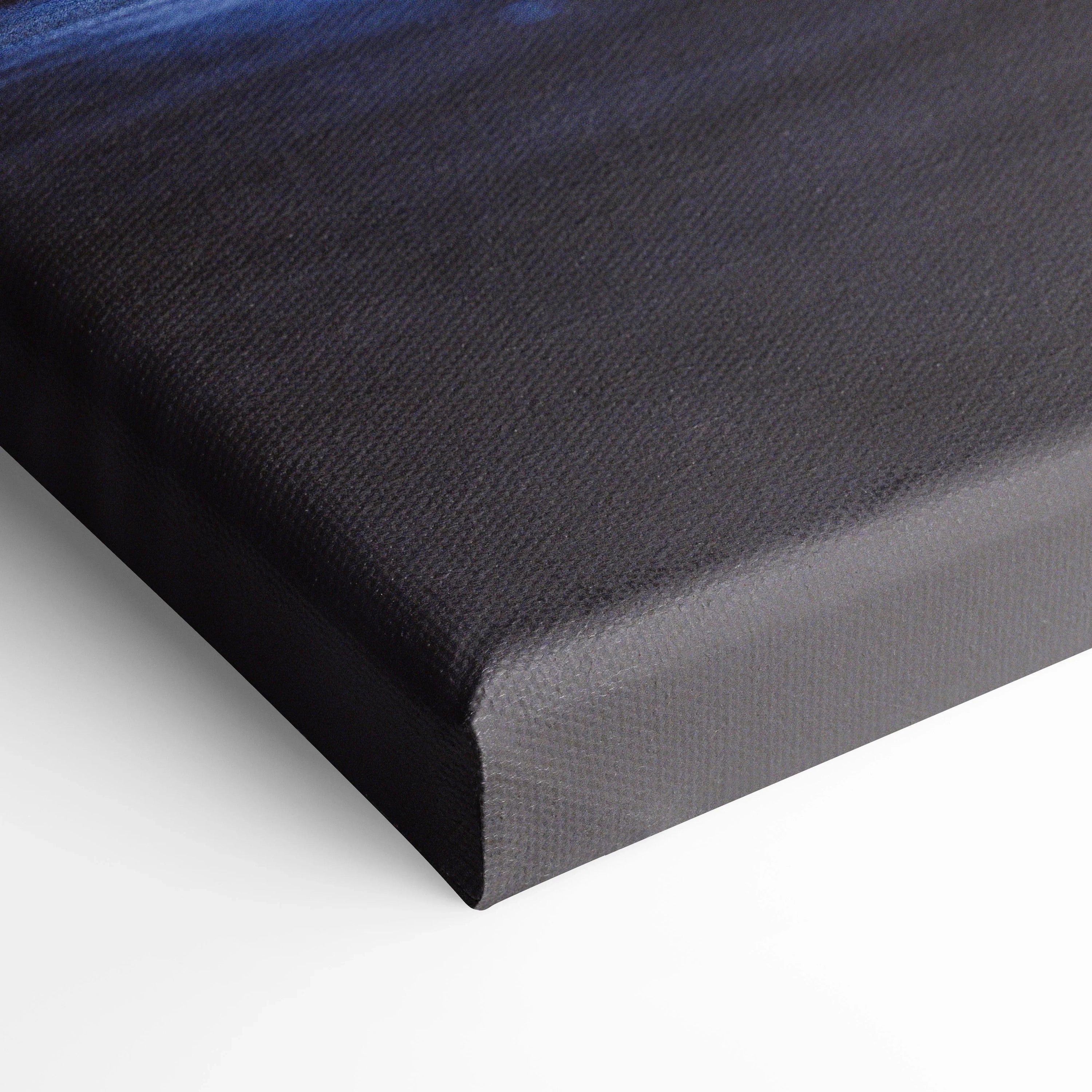 Close-up of black wrapped canvas wall art corner with visible texture and depth for Subaru WRX vertical canvas print.