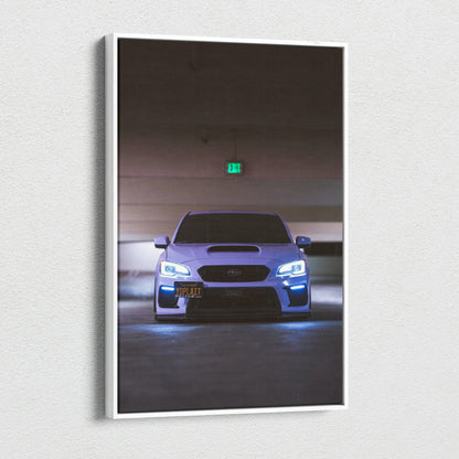 Subaru WRX front view with headlights on in dark garage vertical canvas wall art.
