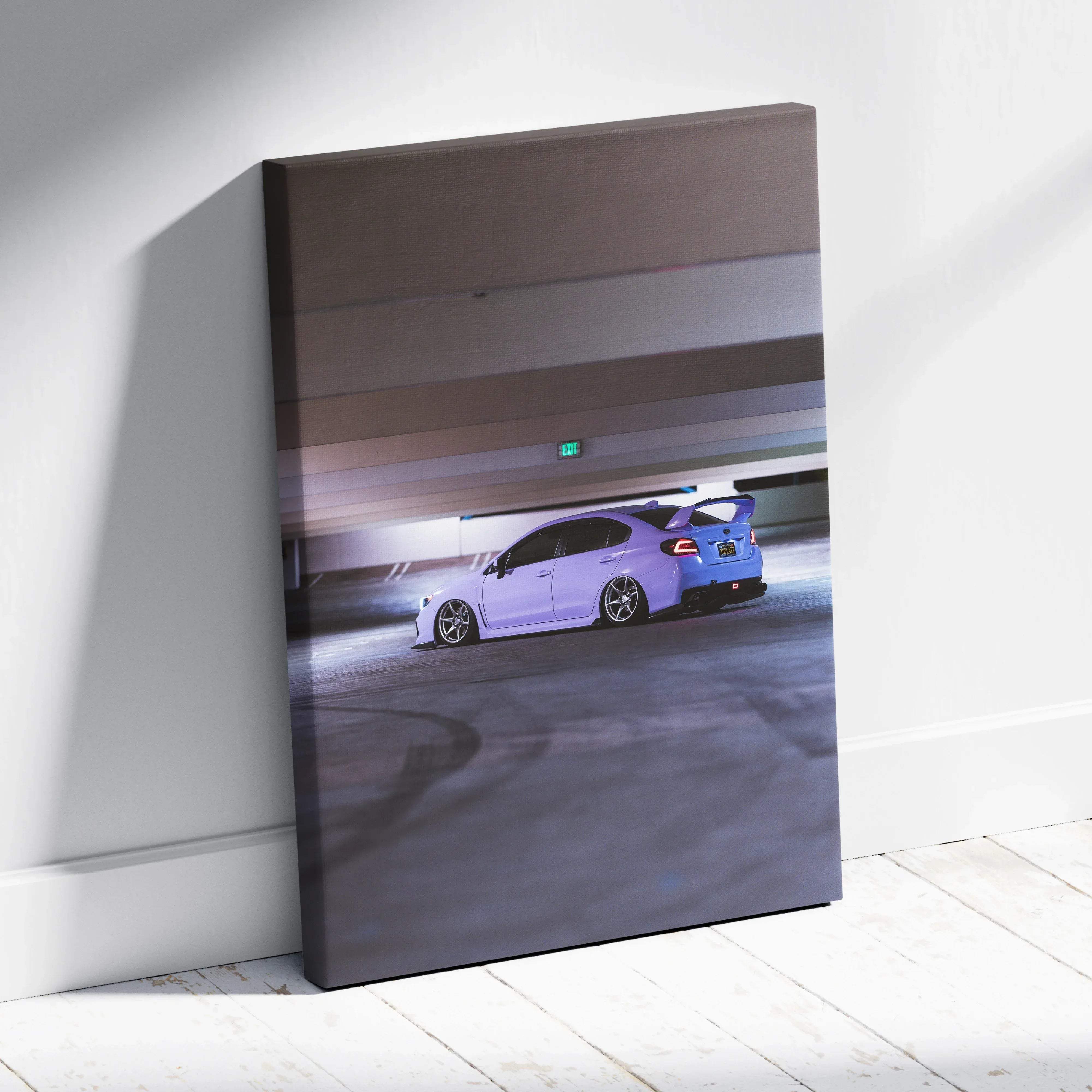Purple subaru sti canvas print featuring a sporty sedan with custom wheels and rear spoiler in a night mood design