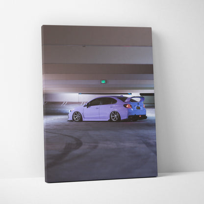 Subaru WRX car canvas art showing sleek white sports car in dimly lit parking garage wall art.