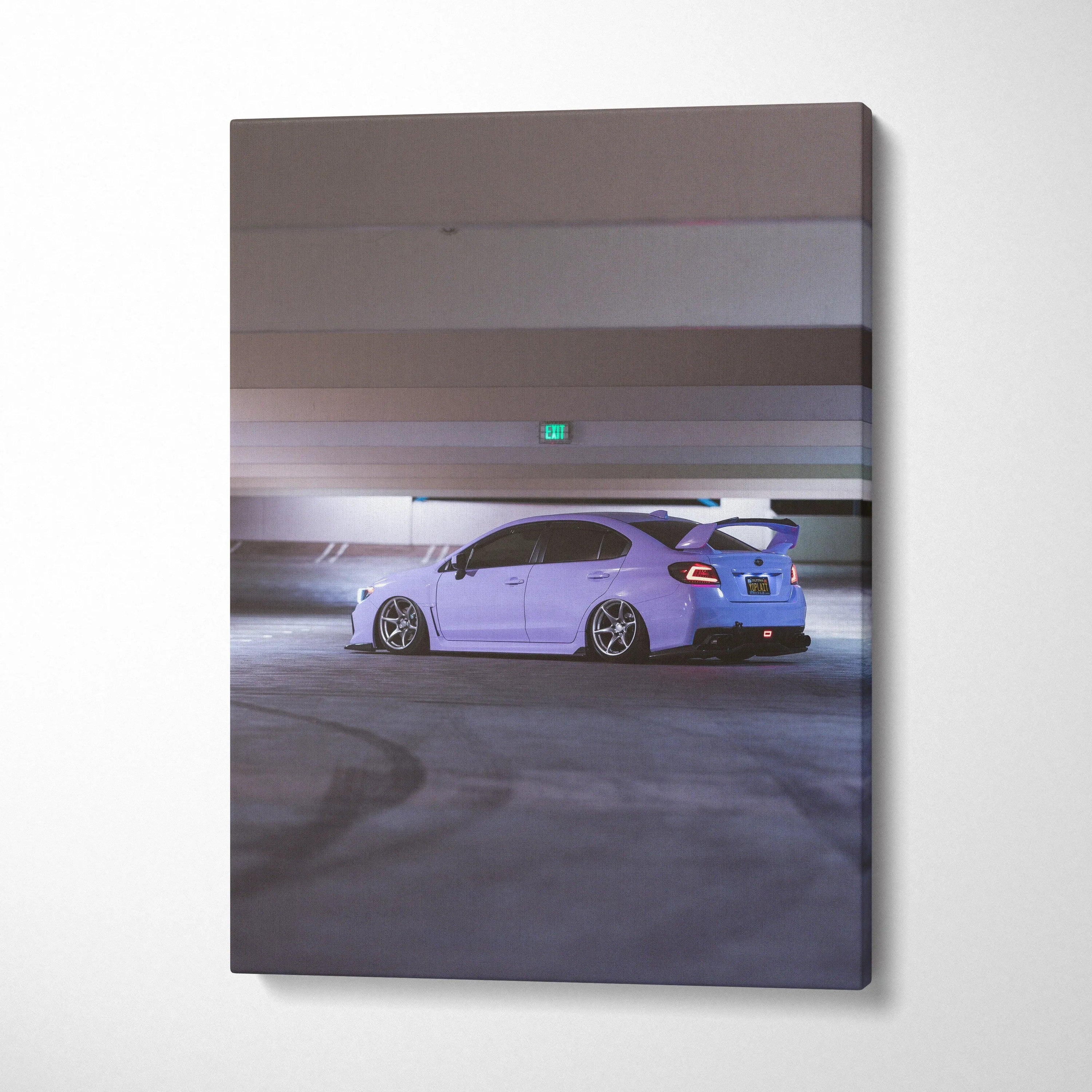 Blue Subaru WRX parked in dim garage captured on vertical canvas wall art print.