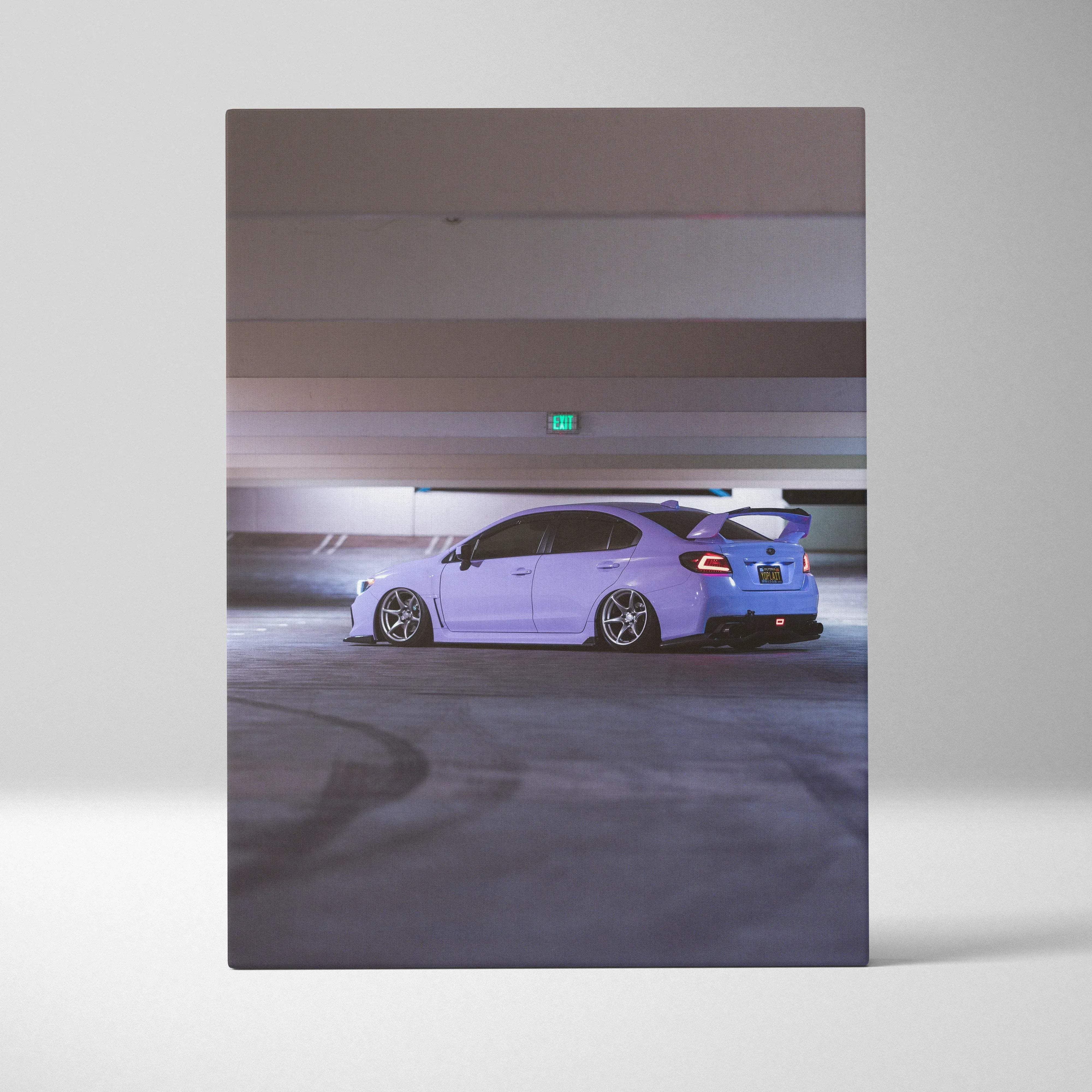 Canvas wall art of a sleek lavender subaru wrx sti with lowered suspension and custom wheels in an underground garage
