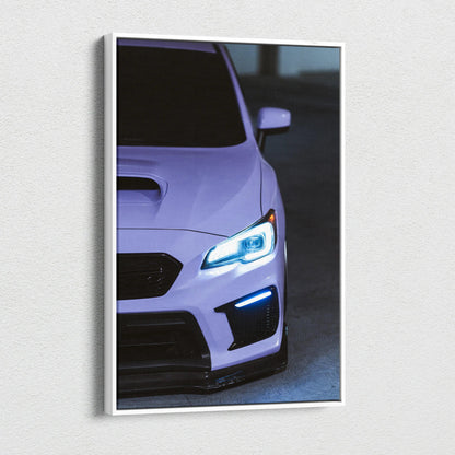 Subaru WRX front close-up with glowing headlights on vertical canvas wall art.