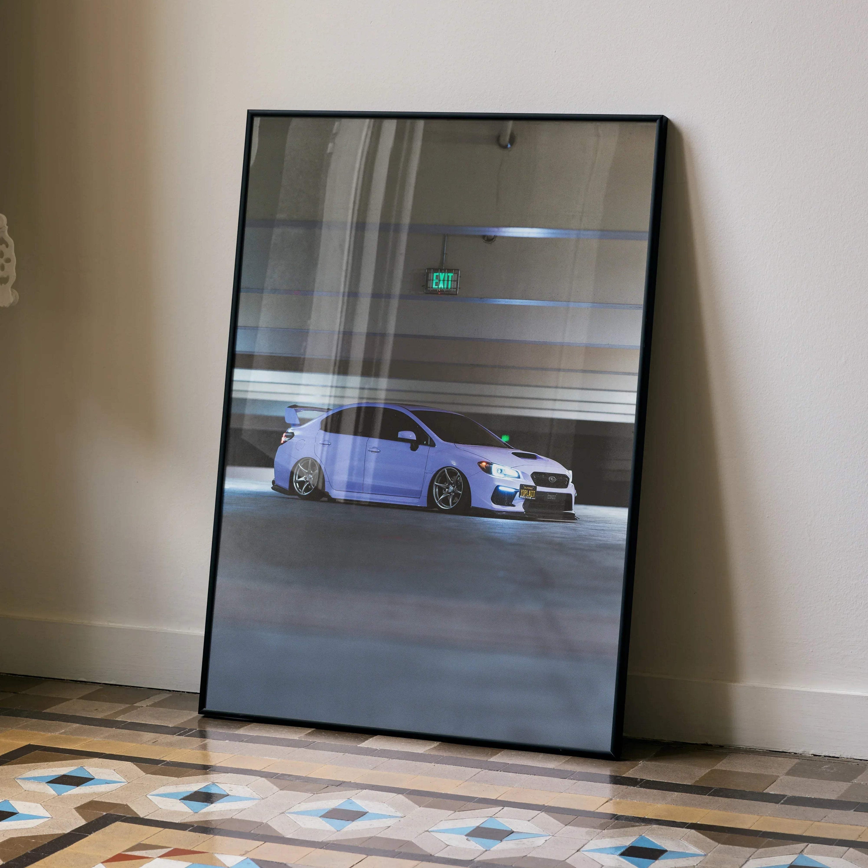Subaru WRX poster with sleek white sports car racing on dark track, premium wall art in black frame.