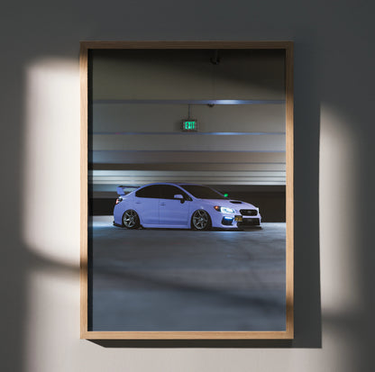 Subaru WRX parked in a dimly lit garage poster wall art with sleek white car and sporty design.