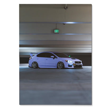 White Subaru WRX parked in dimly lit modern garage poster wall art.