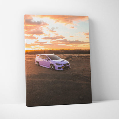 Subaru WRX car canvas wall art with sunset sky and open landscape background.