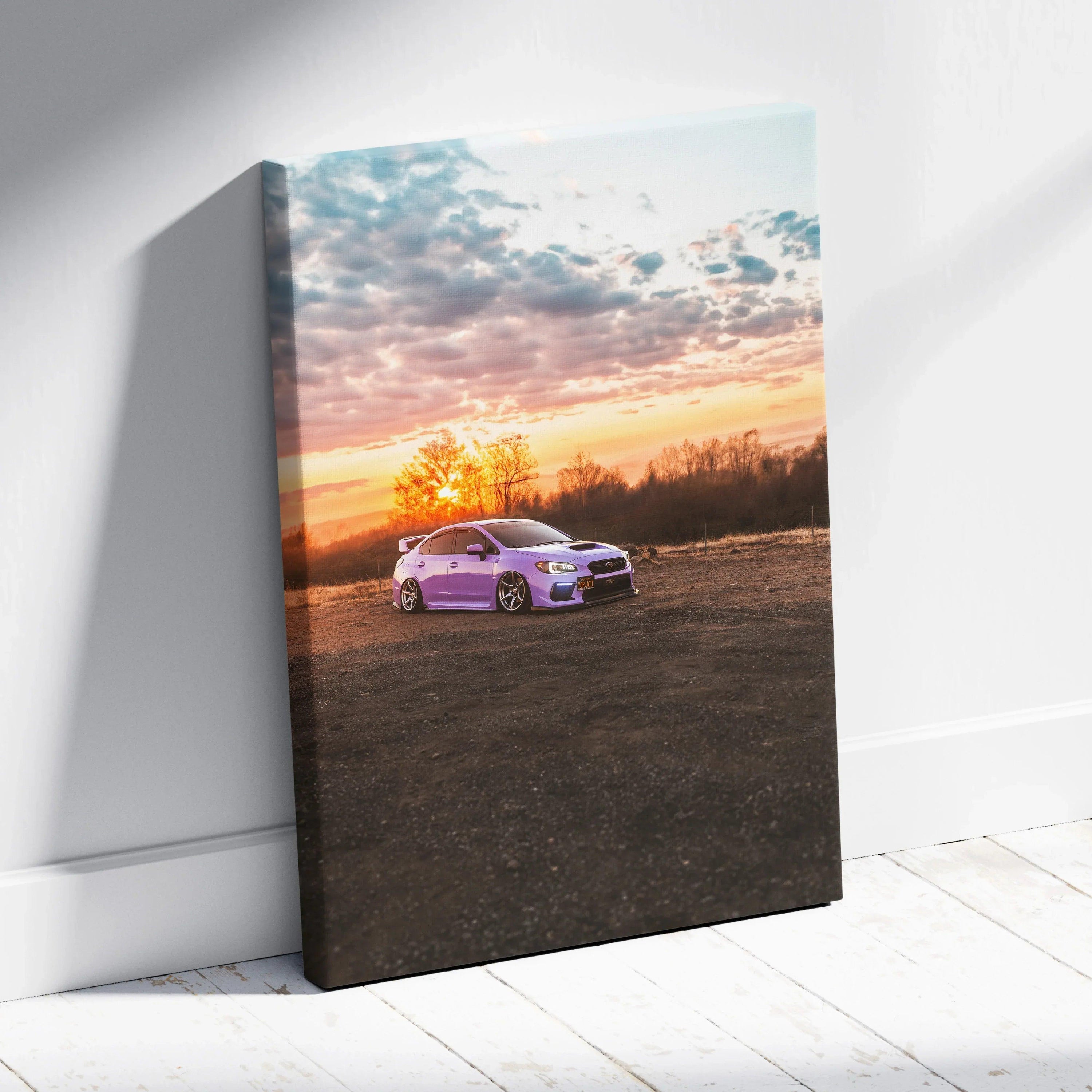 Subaru WRX purple car at sunset on canvas wall art with vibrant sky and landscape background.