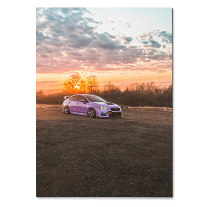 Subaru WRX parked on dirt with vibrant sunset sky poster wall art.