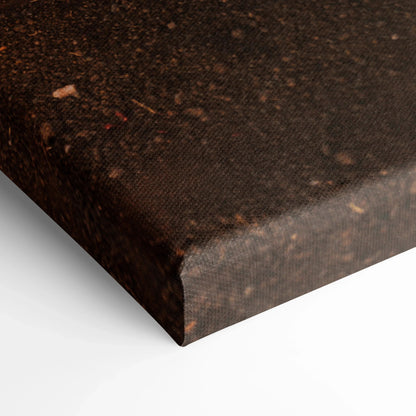 Close-up of textured canvas wrap corner with dark brown tones for wall art.