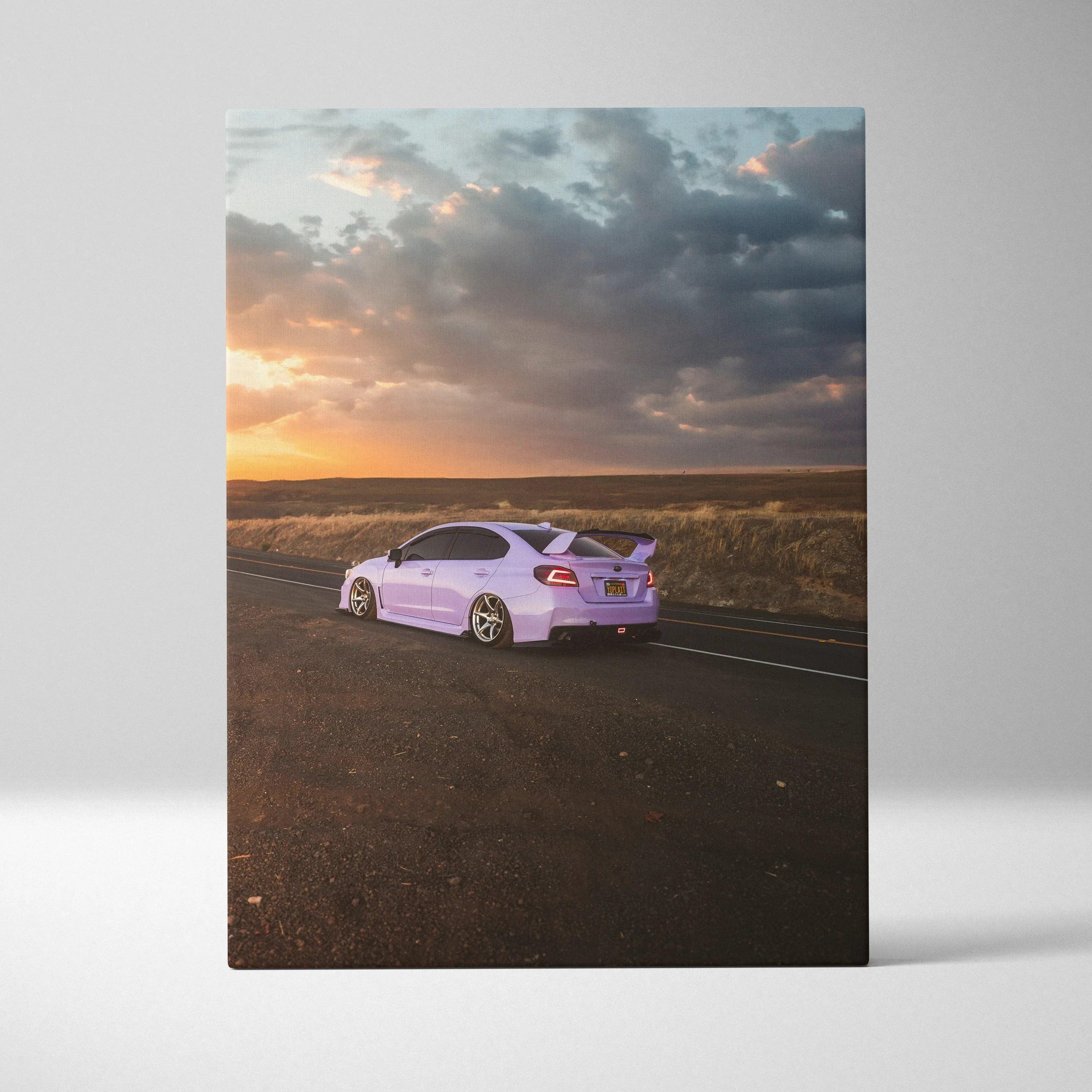 Subaru WRX sports car on road at sunset canvas wall art with dramatic sky.