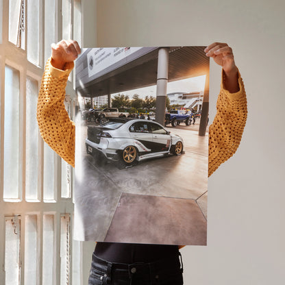 Mitsubishi Evo 10 poster with white sports car and black accents, displayed as premium wall art.