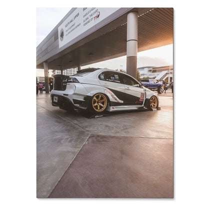 Mitsubishi Evo 10 white with custom decals and gold wheels poster wall art.