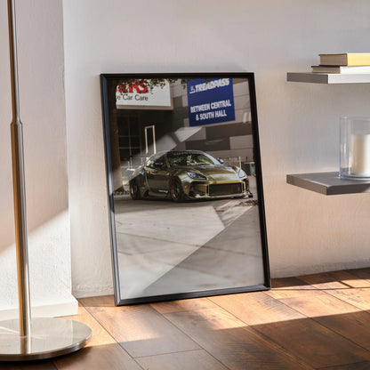 Subaru BRZ automotive art print poster in black frame leaning against wall on wooden floor wall art.