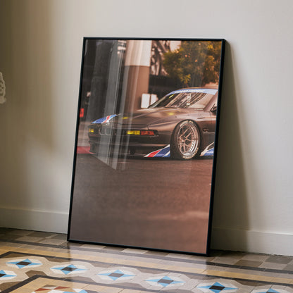 BMW E31 850ci classic car poster with sleek silver sports car and colorful racing stripes wall art.