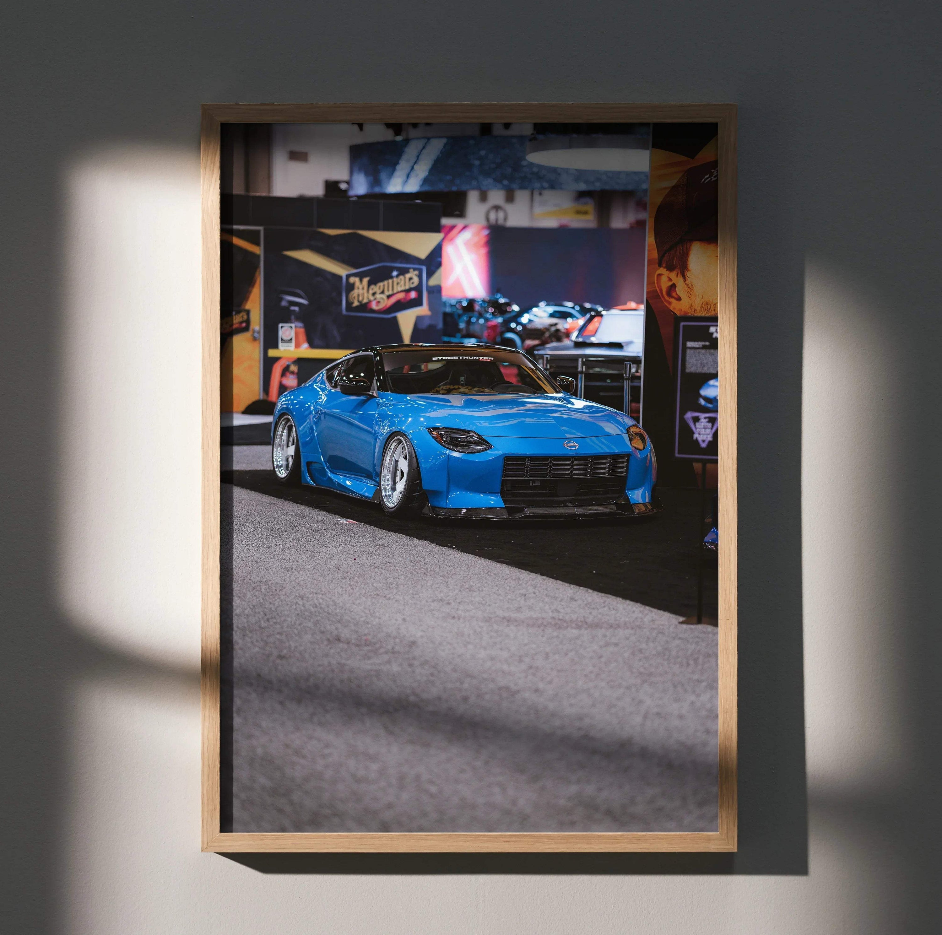 Nissan Z (RZ34) blue sports car poster with urban background, framed wall art.