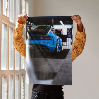 Nissan Z (RZ34) in vibrant blue depicted on high-resolution automotive poster wall art.
