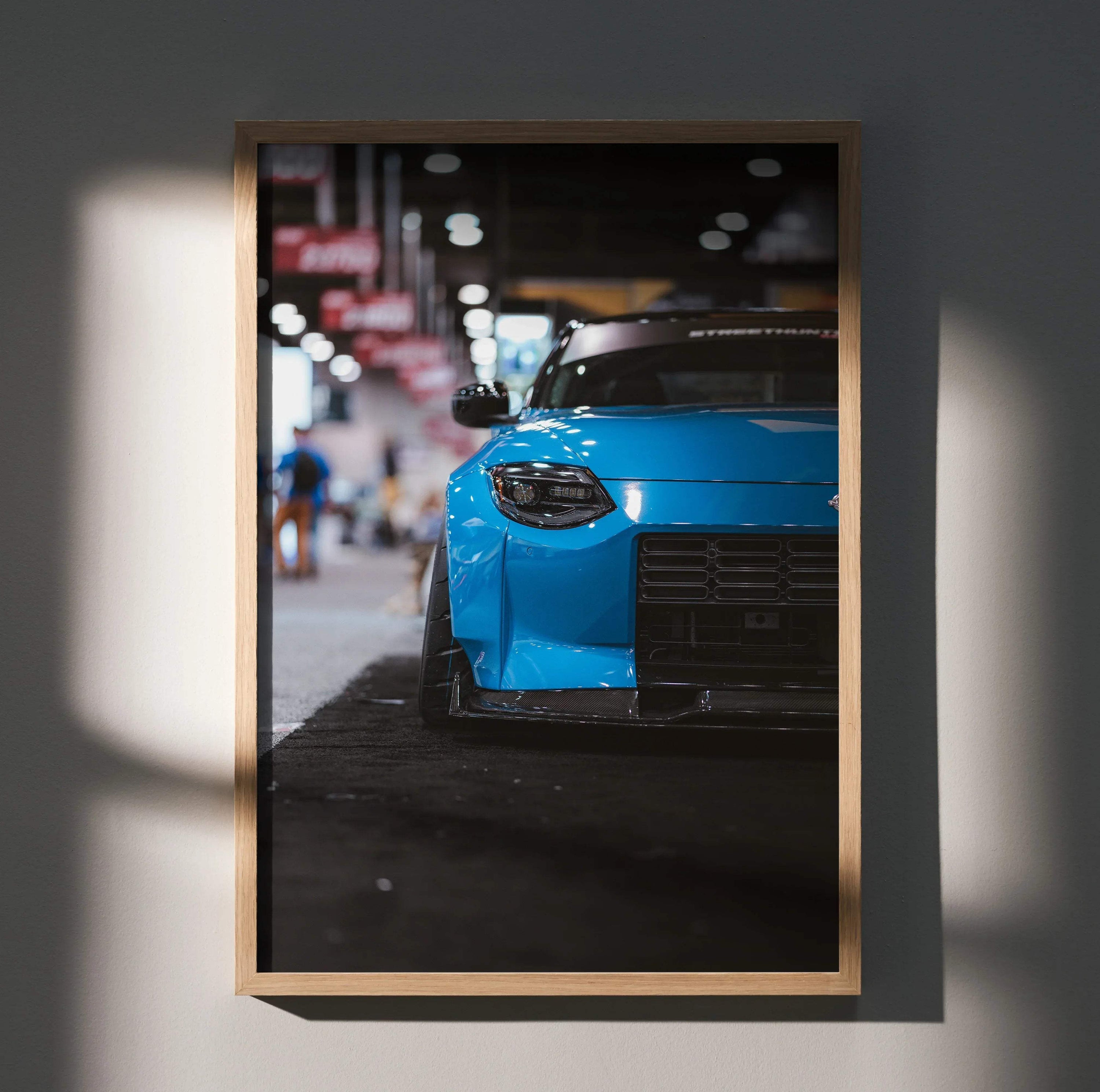Nissan Z (RZ34) front close-up in vibrant blue poster wall art with sleek automotive details.