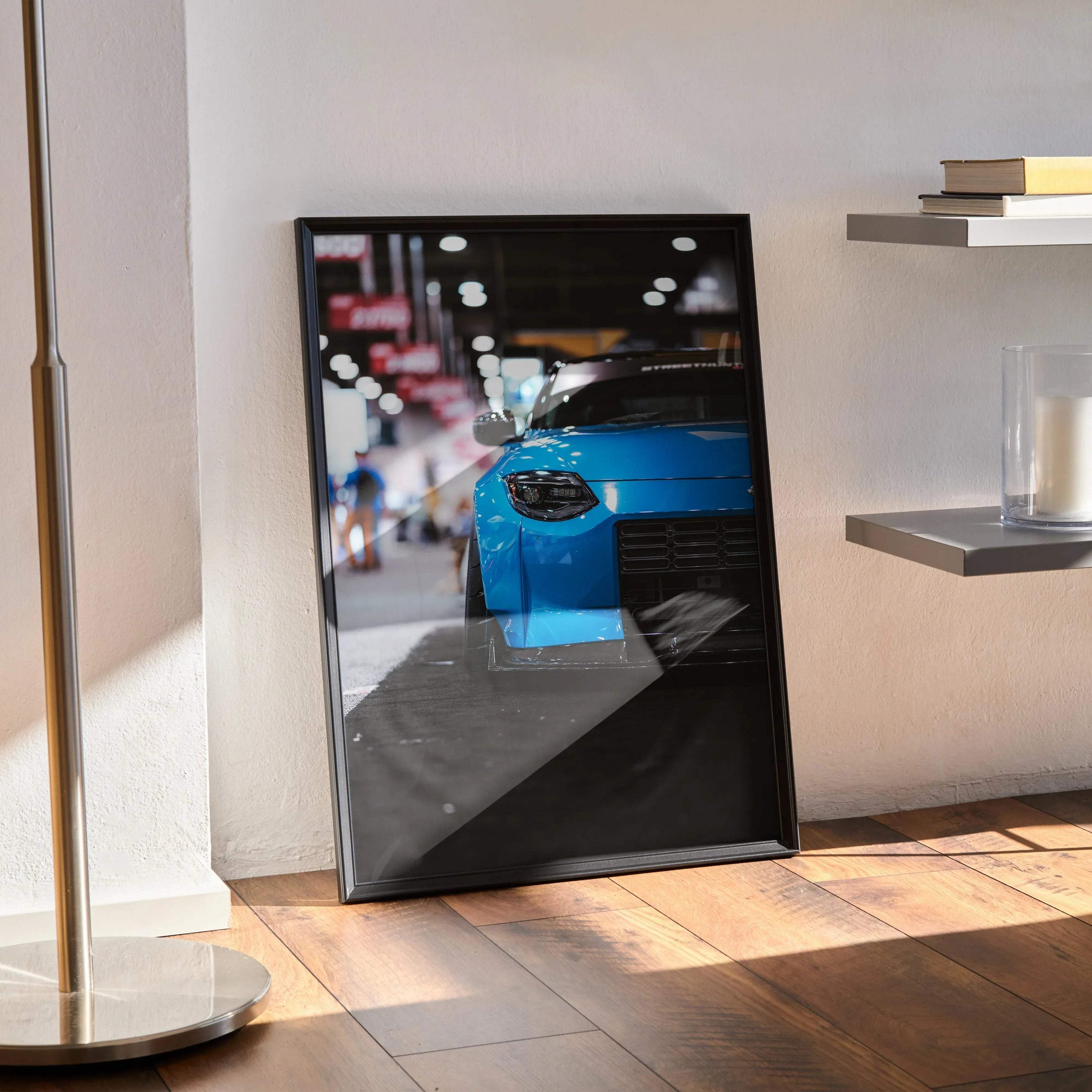 Nissan Z (RZ34) blue sports car close-up poster leaning on floor, automotive wall art.