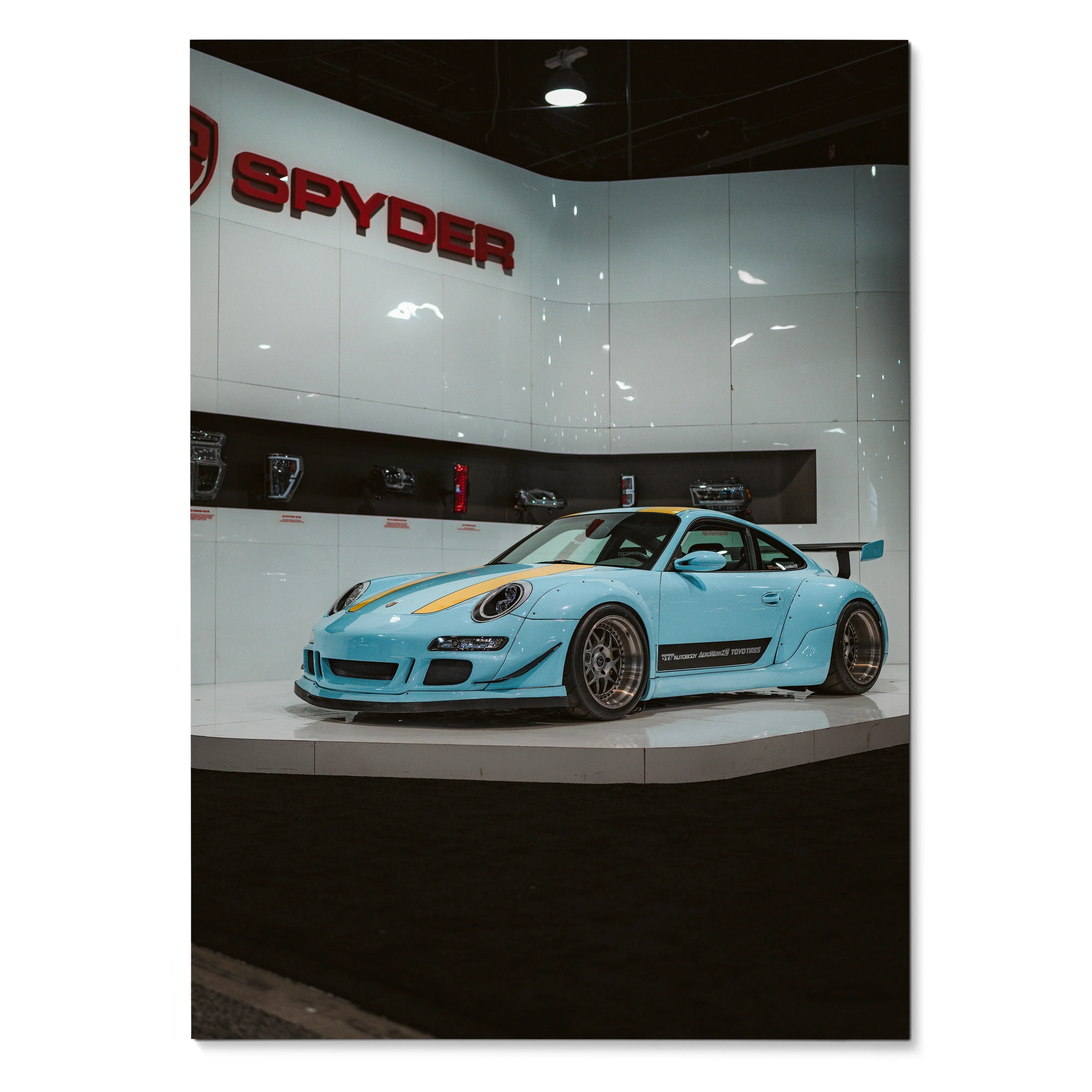 Porsche 911 GT3 RS in light blue displayed as automotive wall art poster with Spyder branding.