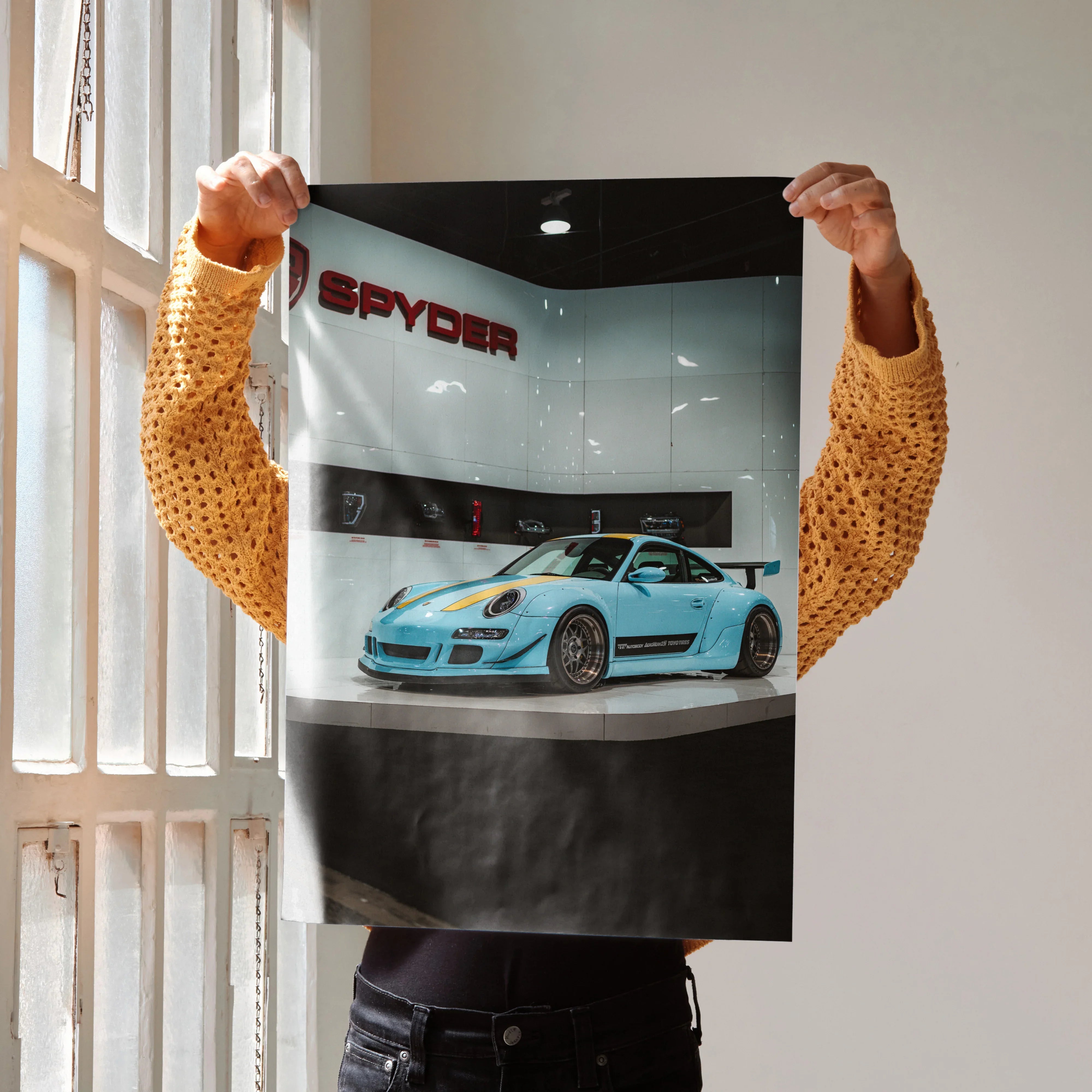 Porsche 911 Carrera 4 Spyder in blue on glossy automotive poster wall art.