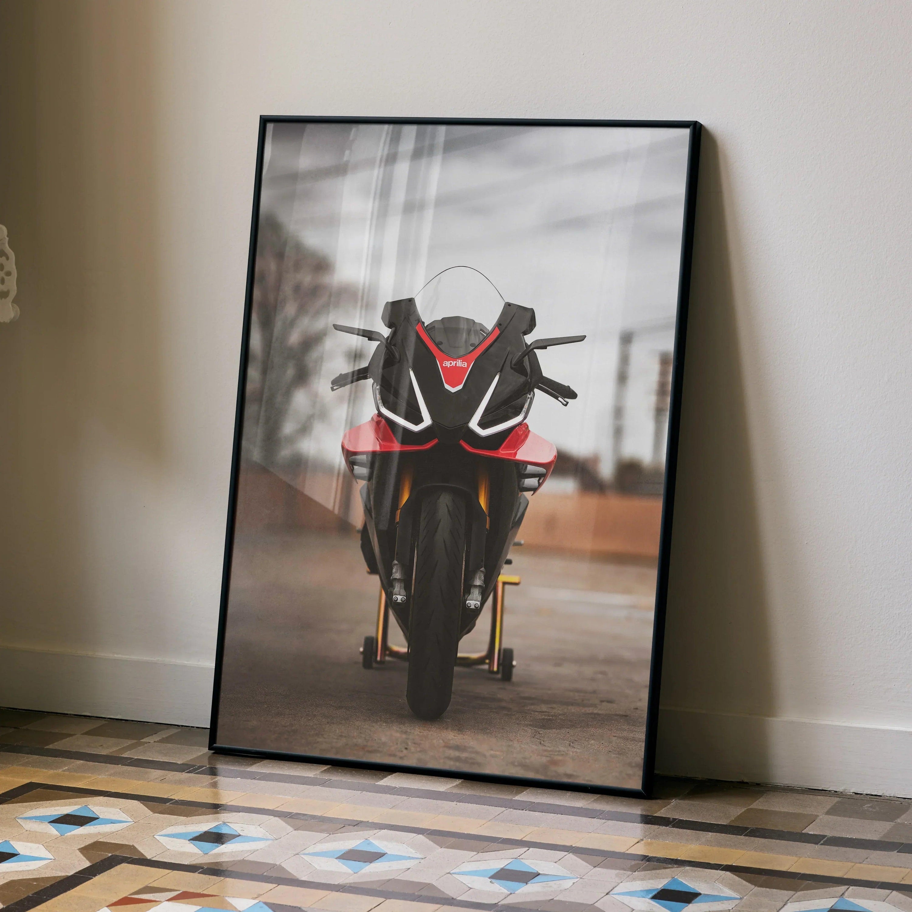 Aprilia RSV4 1100 Factory motorcycle poster with black and red racing design leaning against wall, premium wall art.