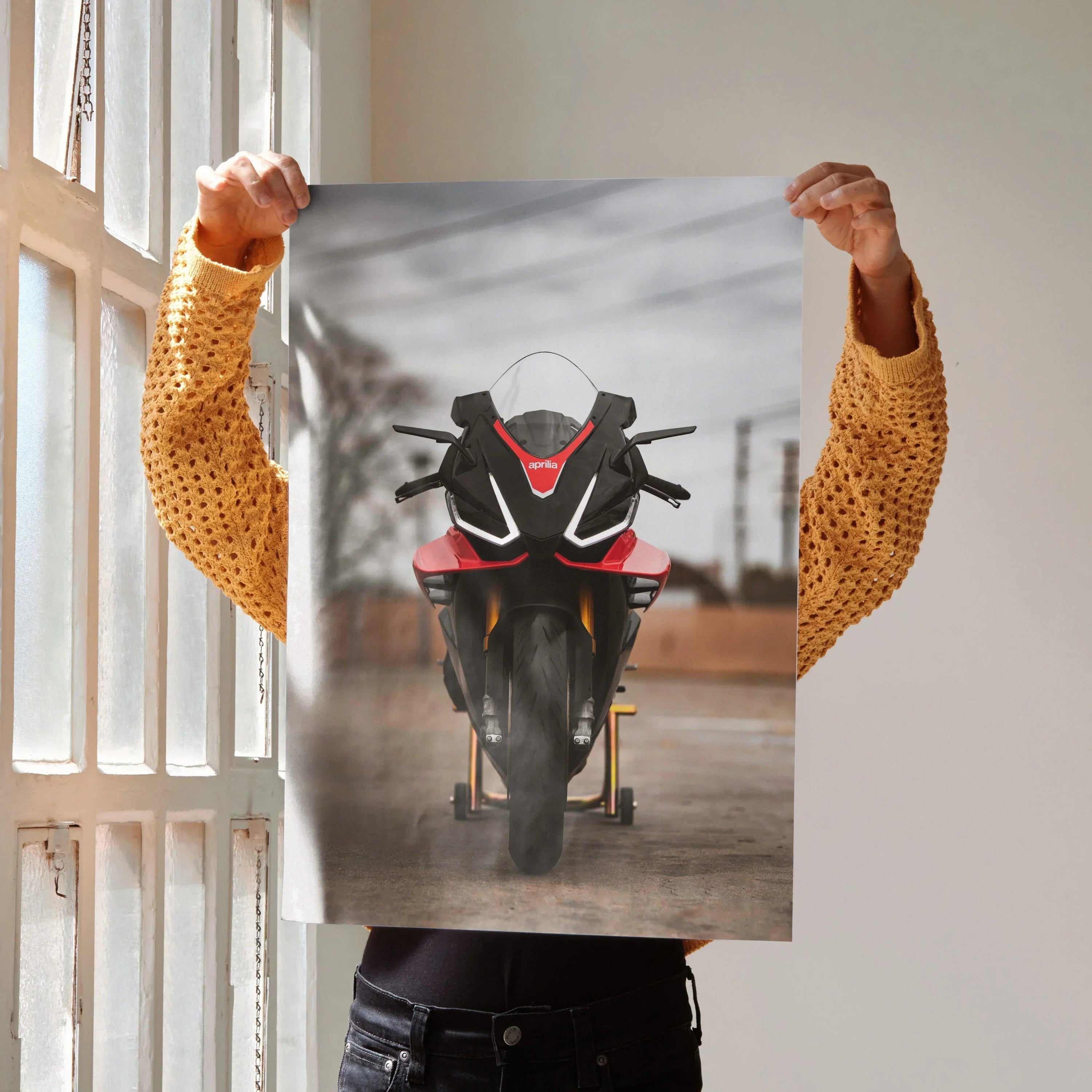 Aprilia RSV4 1100 Factory motorcycle poster with sharp red and black design wall art in bright setting.