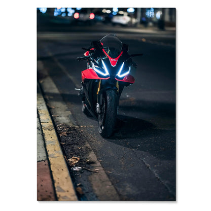 RSV4 1100 Factory motorcycle with glowing headlights at night poster wall art.