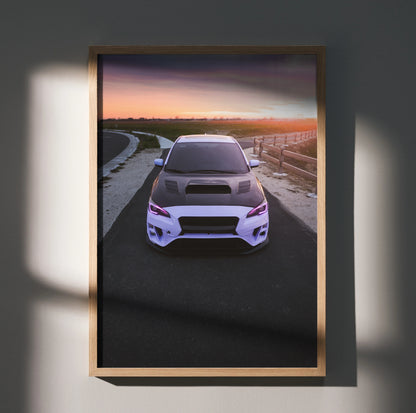 Subaru WRX front view poster with sunset road background framed wall art.