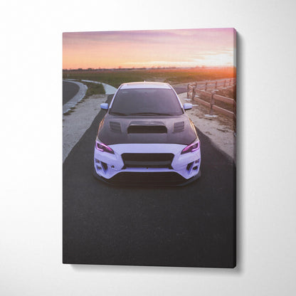 Subaru WRX on road at sunset canvas wall art with vibrant sky vertical canvas print.
