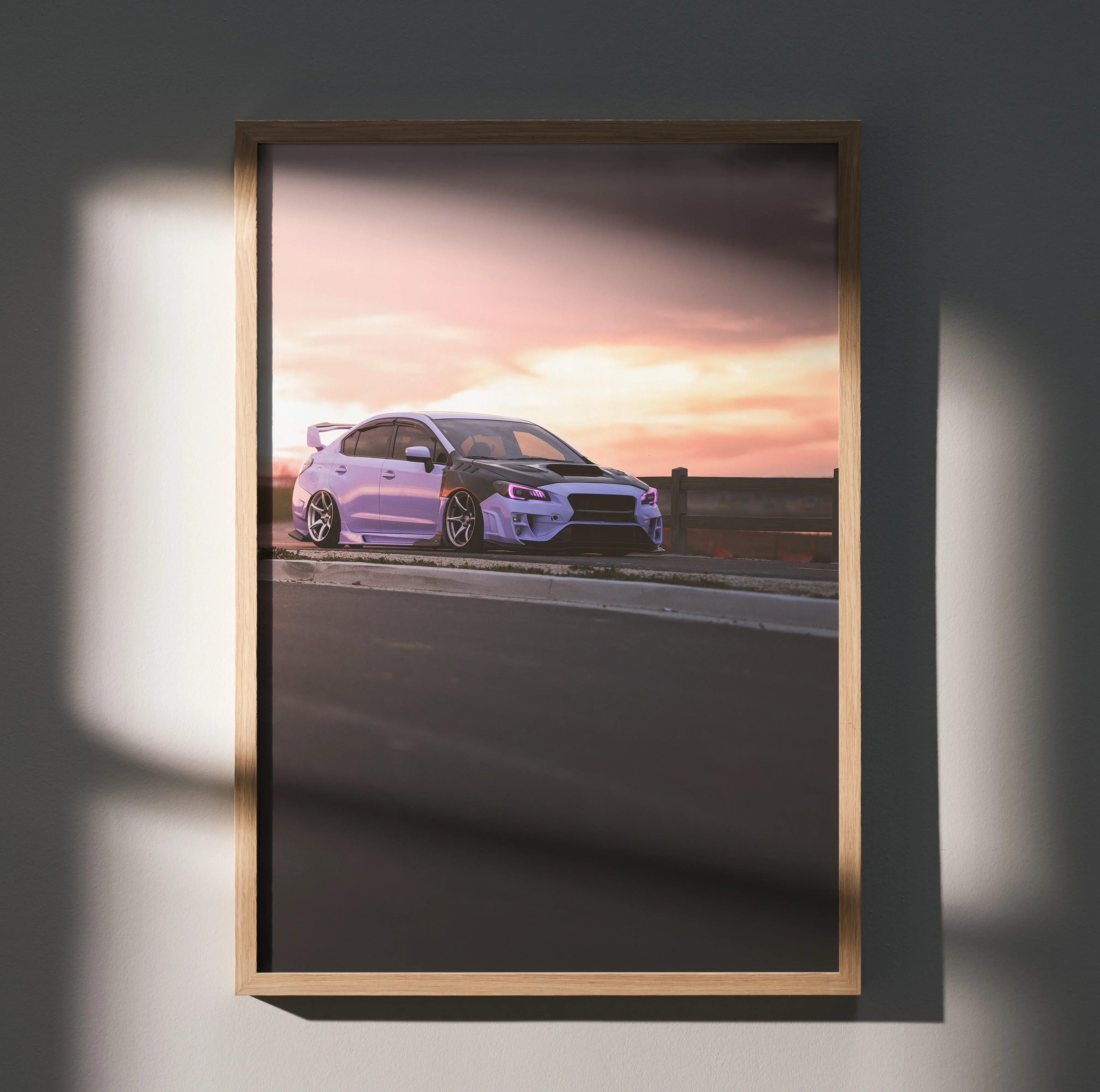 Subaru WRX wall art poster with sunset background in wooden frame.