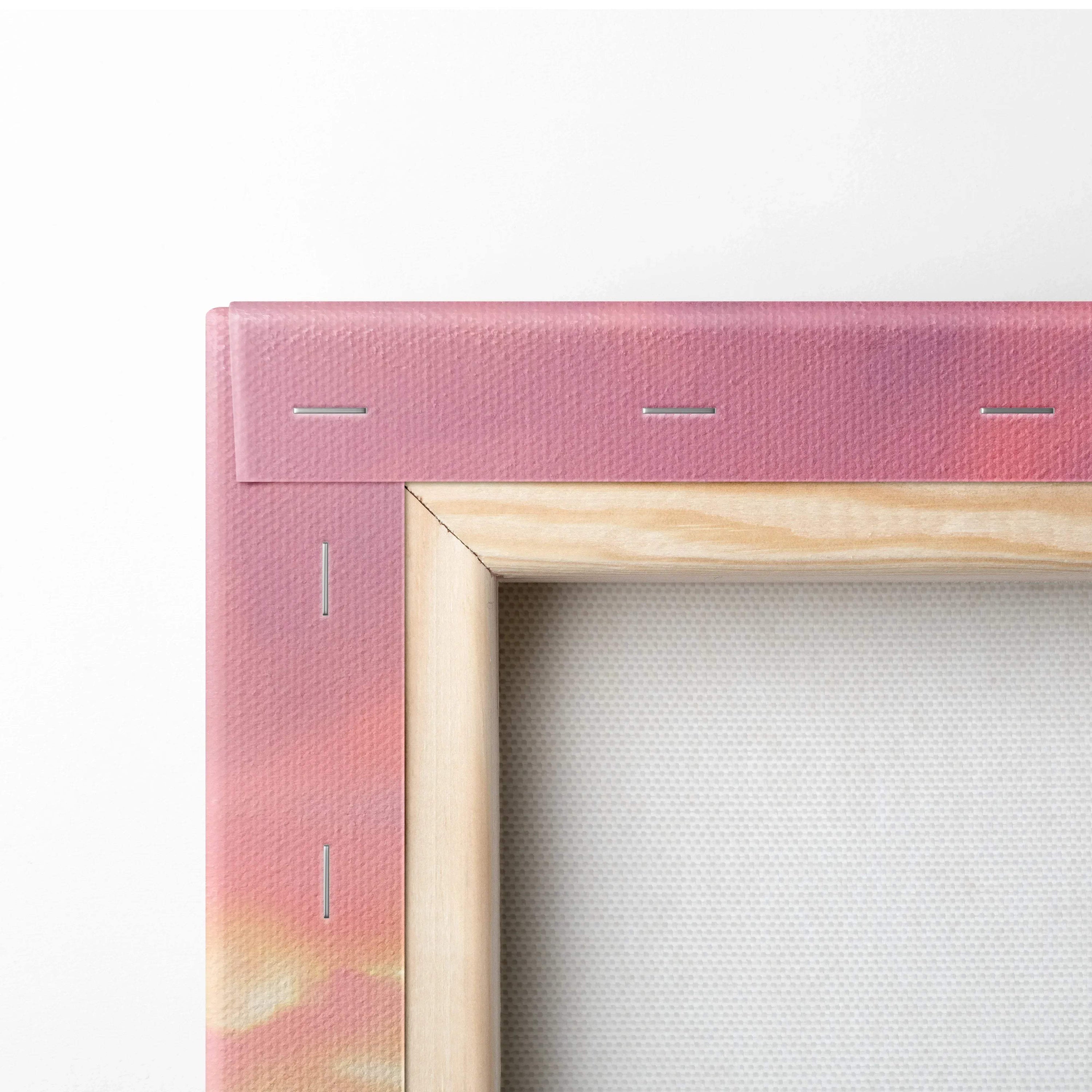 Close-up of wooden stretcher frame and pink canvas edge for vertical wall art print.