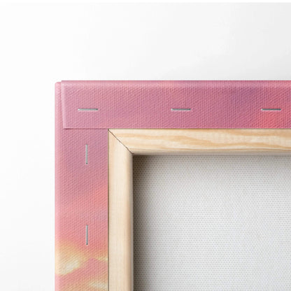 Close-up of wooden stretcher frame and pink canvas edge for vertical wall art print.