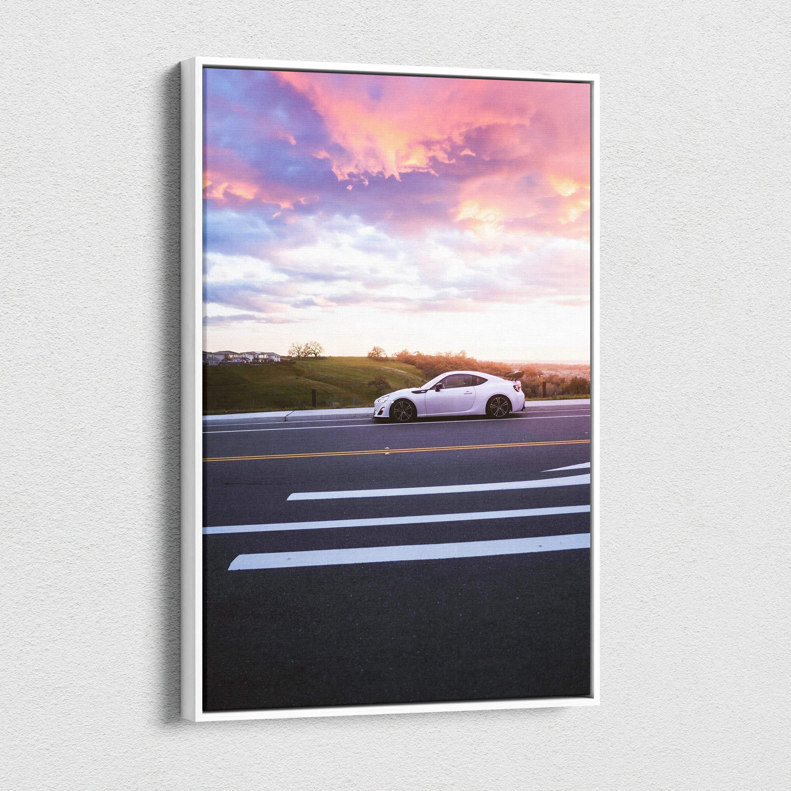 Toyota FRS white car on road at sunset vertical canvas wall art with colorful sky background.