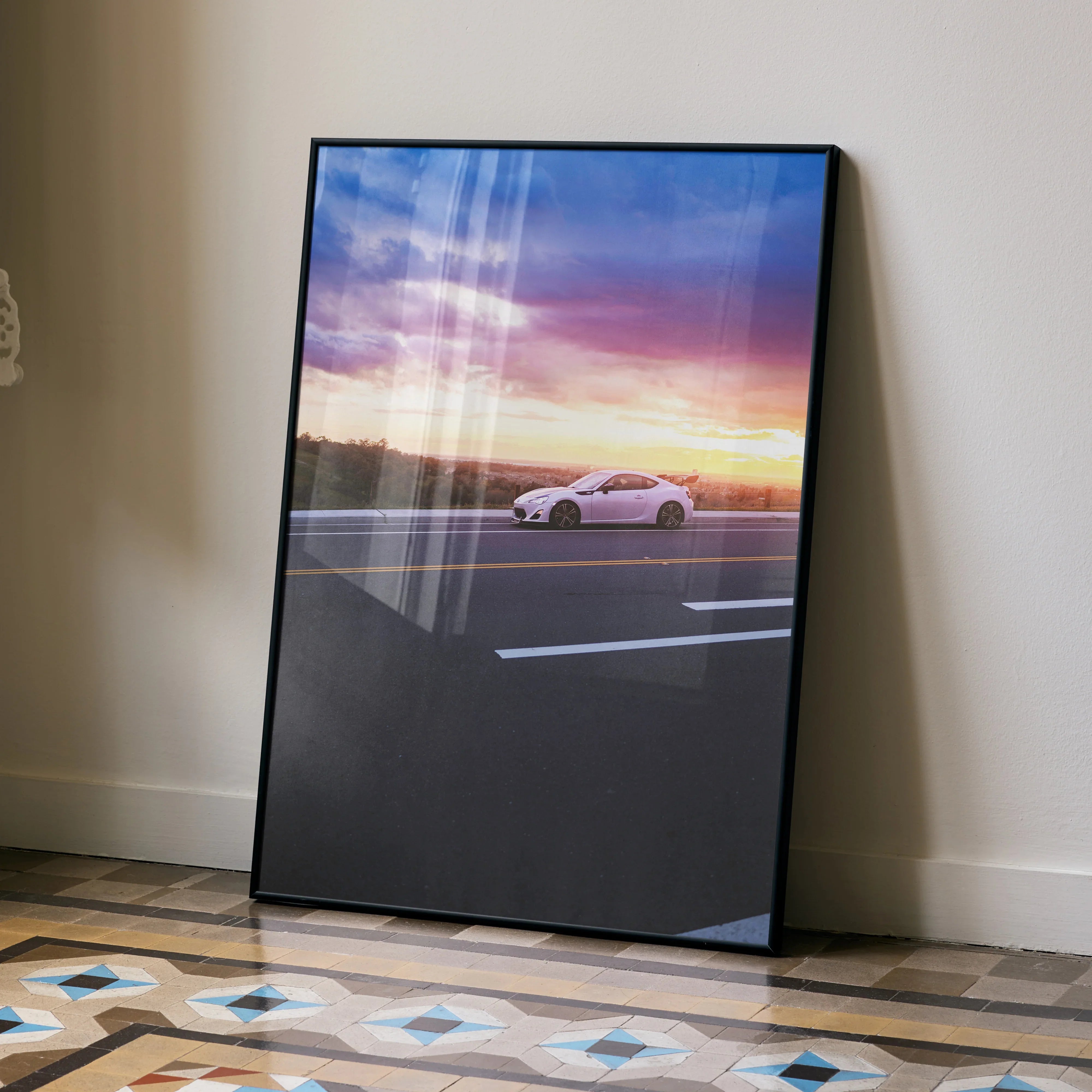 Toyota FRS luxury car poster with sunset sky in sleek black frame, modern wall art.