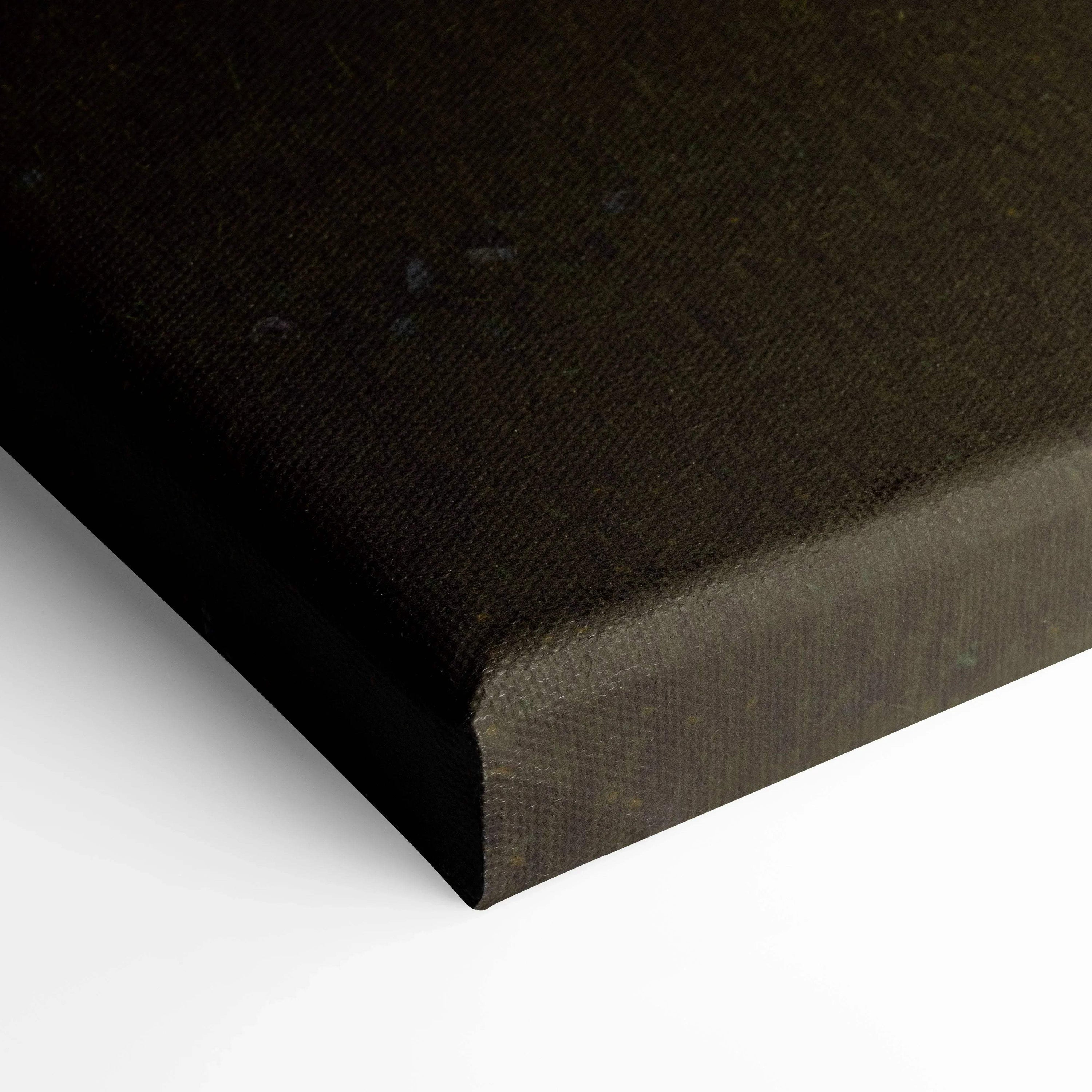 Close-up of black canvas edge with textured woven fabric showcasing vertical wall art print.