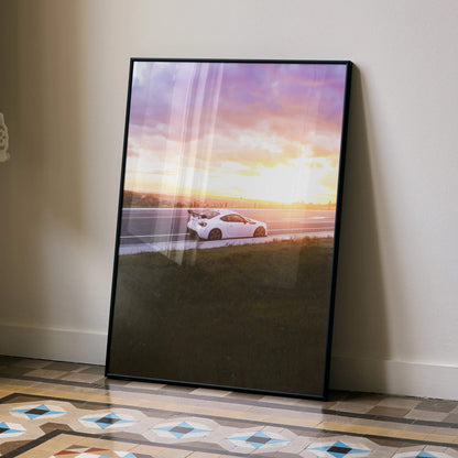 Toyota FRS poster featuring white car at sunset with vibrant sky, wall art in black frame.