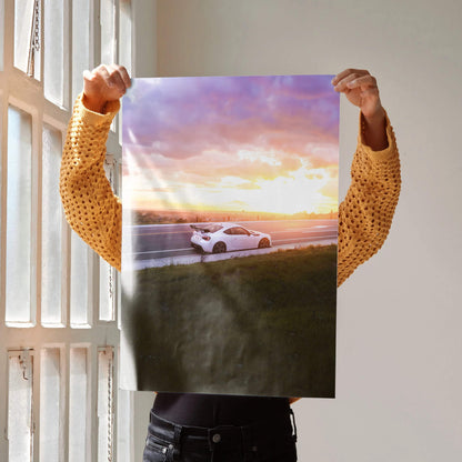 Toyota FRS poster wall art featuring a white car at sunset over scenic landscape.
