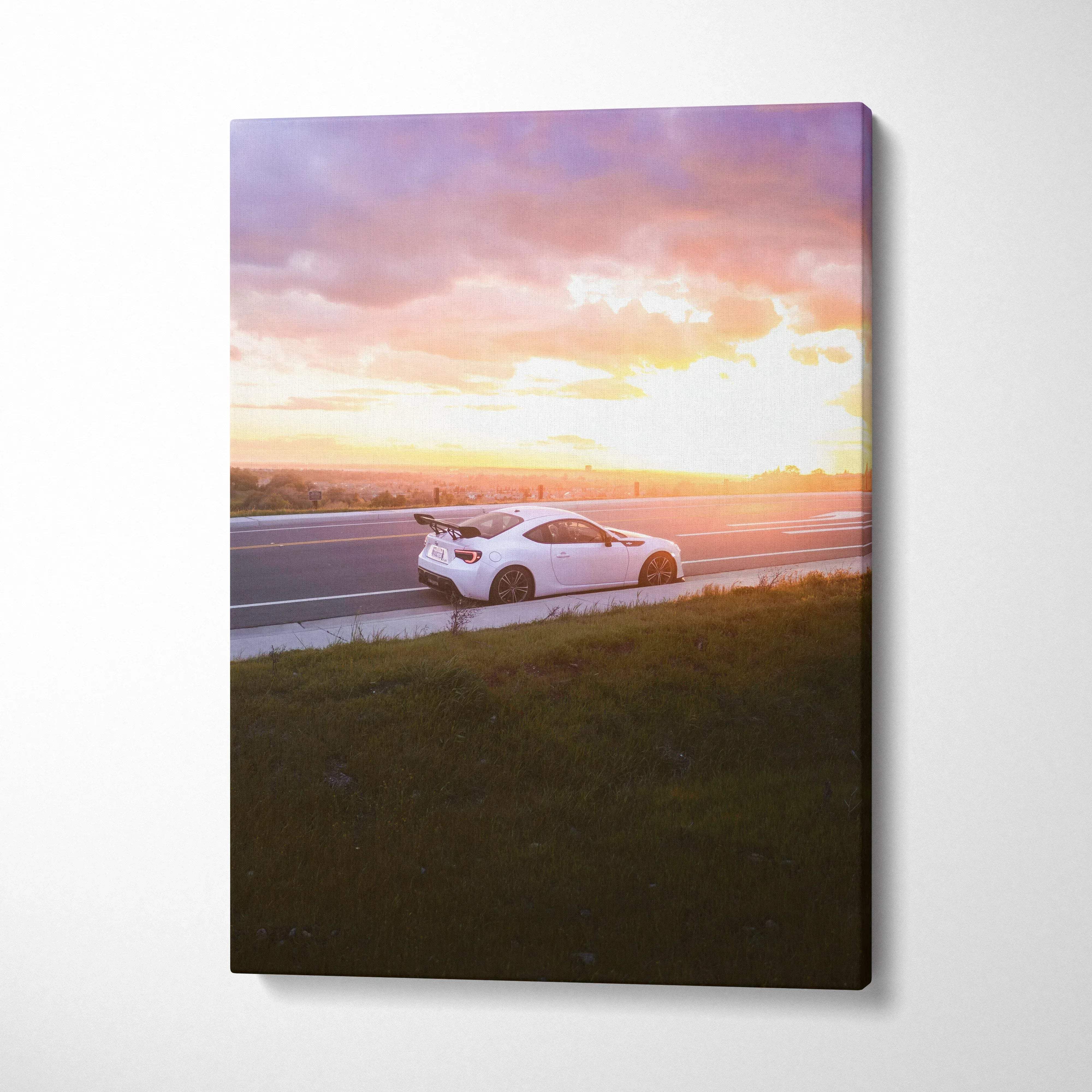 Toyota FRS car driving on road at sunset with vibrant sky canvas wall art.