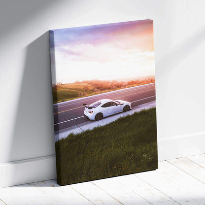 Toyota FRS white car driving at sunset on road canvas wall art vertical print.