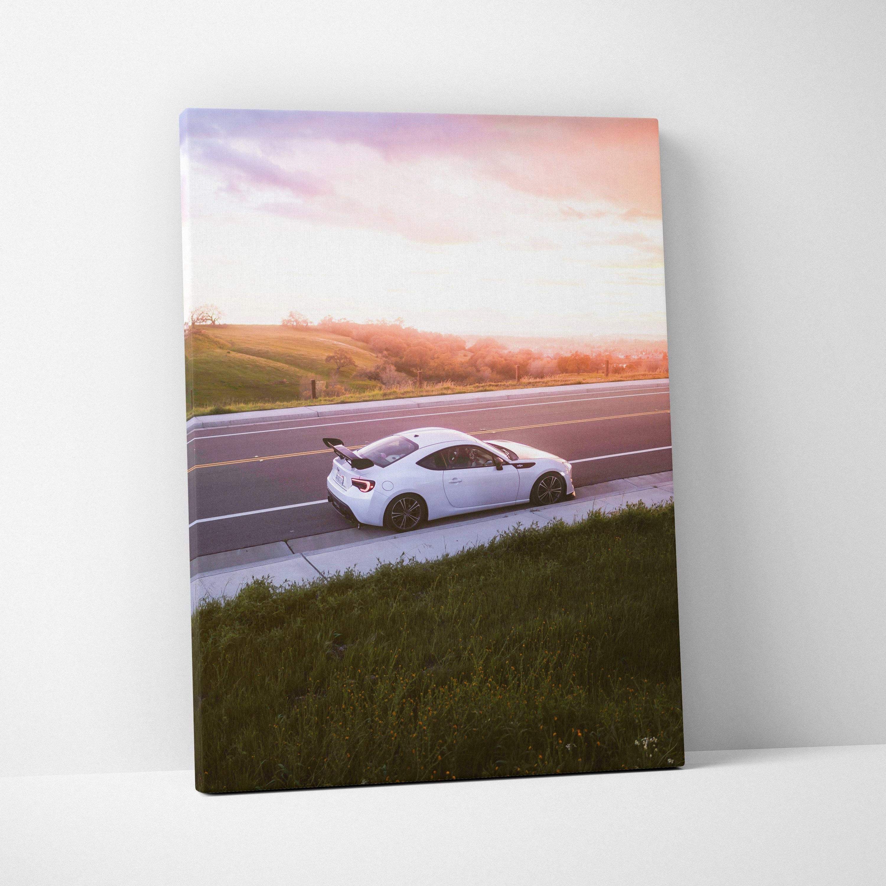 Toyota FRS white car driving on sunset highway canvas wall art print vertical.