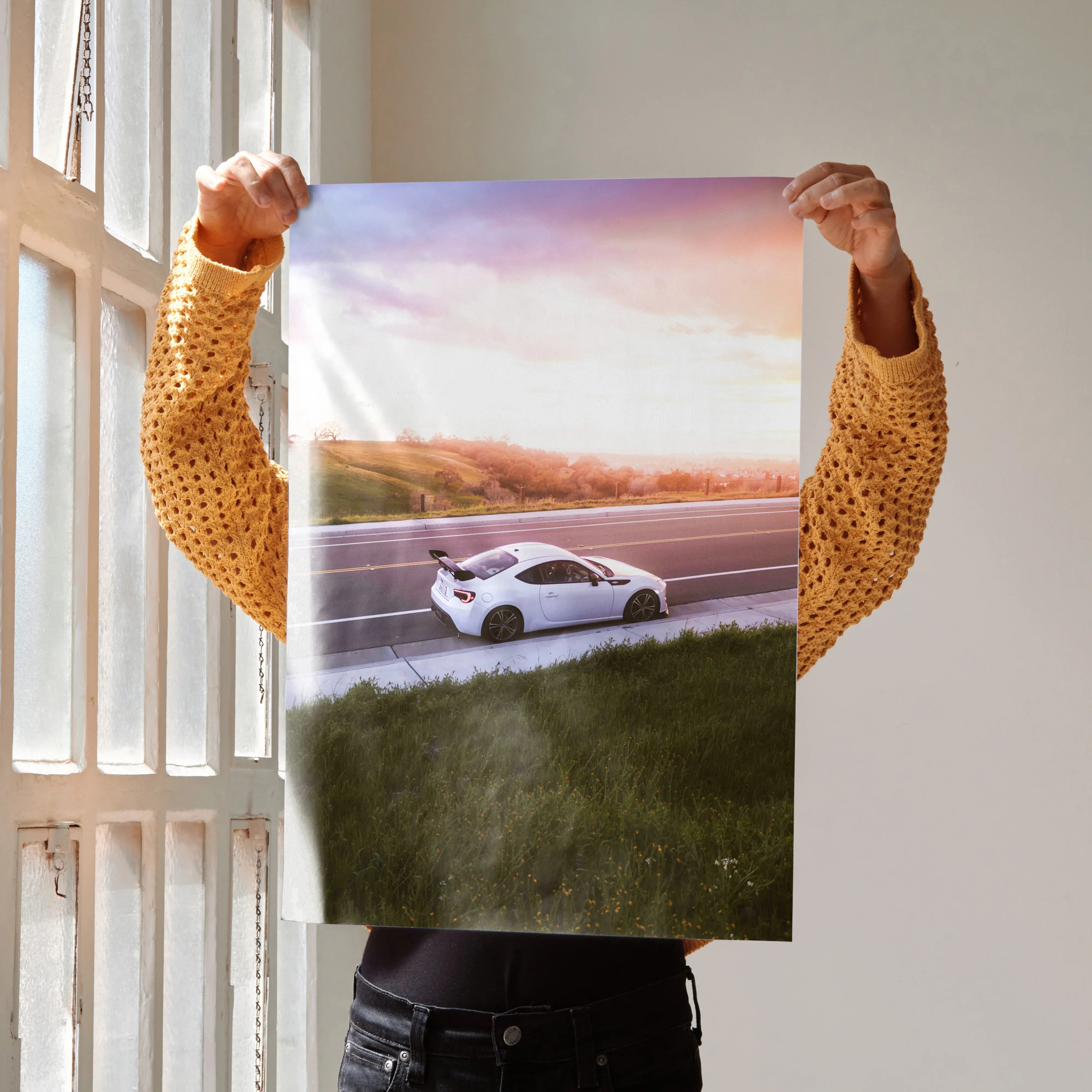 Toyota FRS car racing at sunset on highway poster wall art with vibrant sky colors.