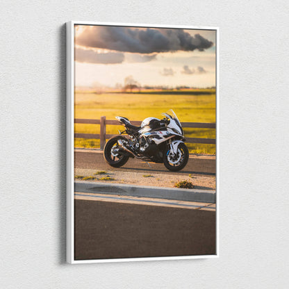 BMW S1000RR motorcycle canvas wall art featuring scenic sunset background, vertical museum-quality print.