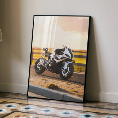 BMW S1000RR motorcycle poster with sunset background in sleek black frame wall art.