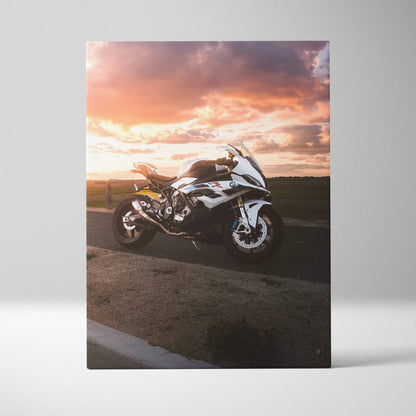 BMW S1000RR motorcycle at sunset on vertical canvas wall art with vibrant sky and road details.