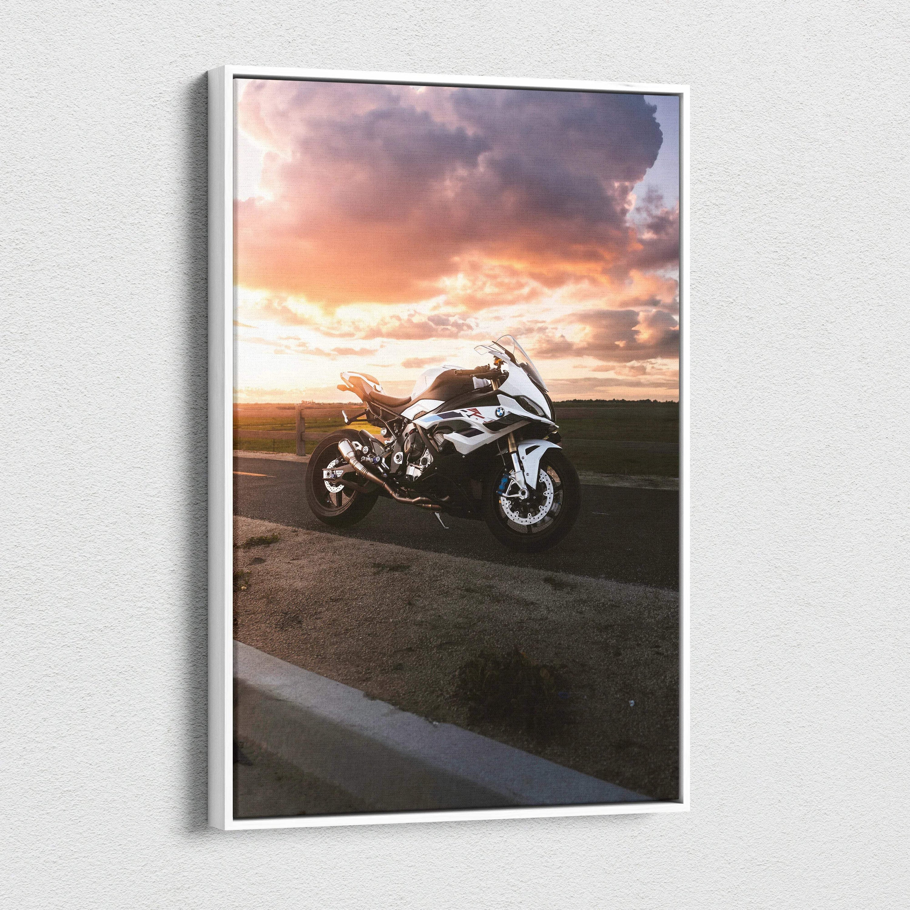 BMW S1000RR motorcycle at sunset on vertical canvas wall art with vibrant sky colors.