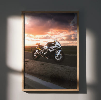 BMW S1000RR motorcycle poster with sunset backdrop, modern wall art in wooden frame.